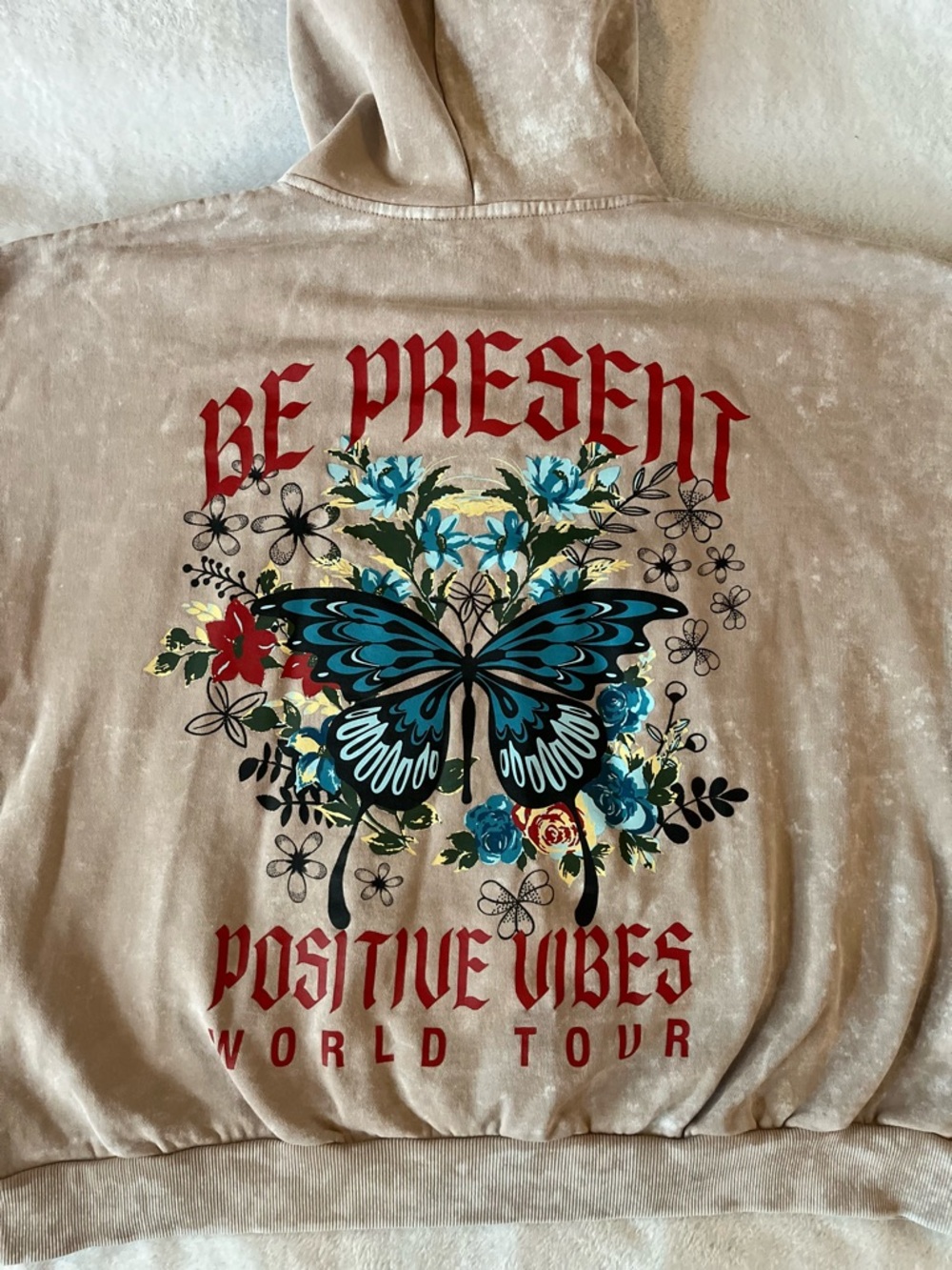 Justify Beige Hoodie with Blue Butterfly & Red Lettering